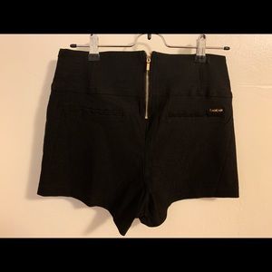 Bebe black short, evening wear,size M